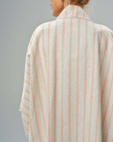 Back view of a lightweight striped linen-cotton kimono, showcasing its relaxed silhouette and soft fabric.
