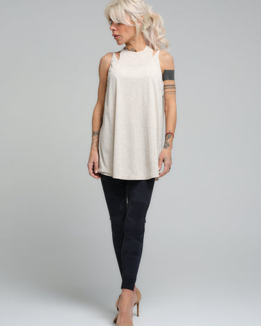 This lightweight, versatile top is a staple for any wardrobe. Crafted from a soft viscose material, it provides a comfortable, relaxed fit that's perfect for everyday wear. Its timeless design ensures it can be paired with anything from casual leggings to a tailored blazer for a smart-casual look.