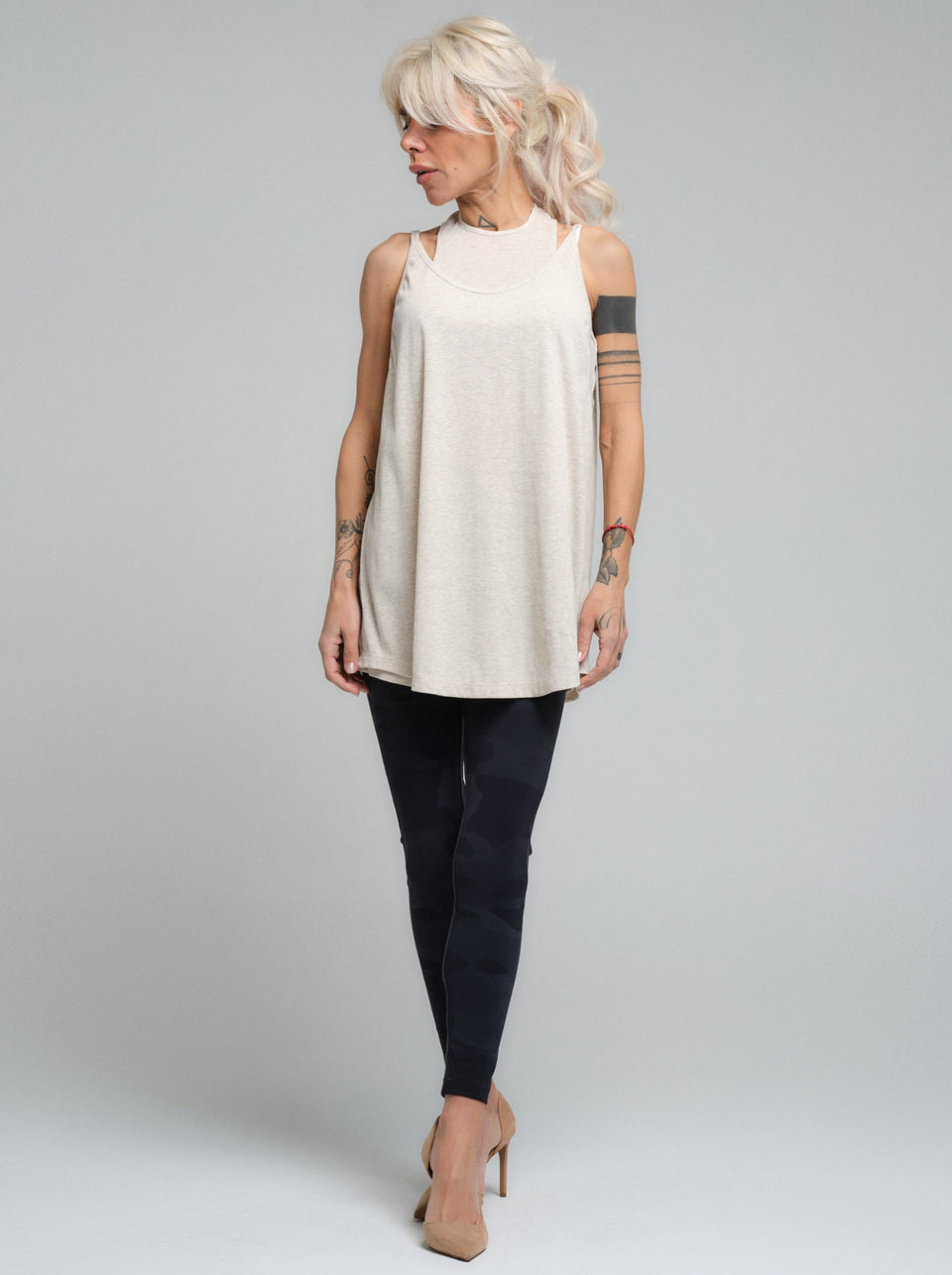 This lightweight, versatile top is a staple for any wardrobe. Crafted from a soft viscose material, it provides a comfortable, relaxed fit that's perfect for everyday wear. Its timeless design ensures it can be paired with anything from casual leggings to a tailored blazer for a smart-casual look.