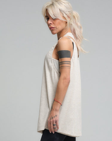 This lightweight, versatile top is a staple for any wardrobe. Crafted from a soft viscose material, it provides a comfortable, relaxed fit that's perfect for everyday wear. Its timeless design ensures it can be paired with anything from casual leggings to a tailored blazer for a smart-casual look.