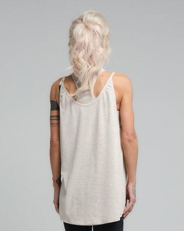 This lightweight, versatile top is a staple for any wardrobe. Crafted from a soft viscose material, it provides a comfortable, relaxed fit that's perfect for everyday wear. Its timeless design ensures it can be paired with anything from casual leggings to a tailored blazer for a smart-casual look.