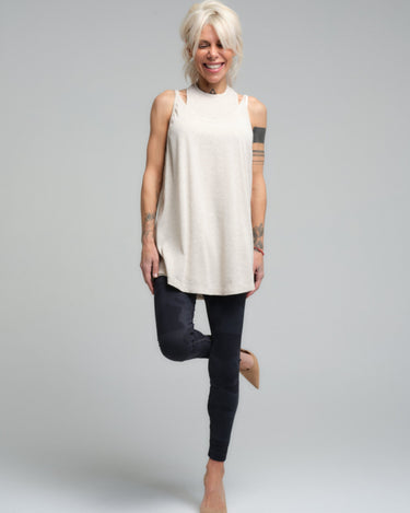 This lightweight, versatile top is a staple for any wardrobe. Crafted from a soft viscose material, it provides a comfortable, relaxed fit that's perfect for everyday wear. Its timeless design ensures it can be paired with anything from casual leggings to a tailored blazer for a smart-casual look.