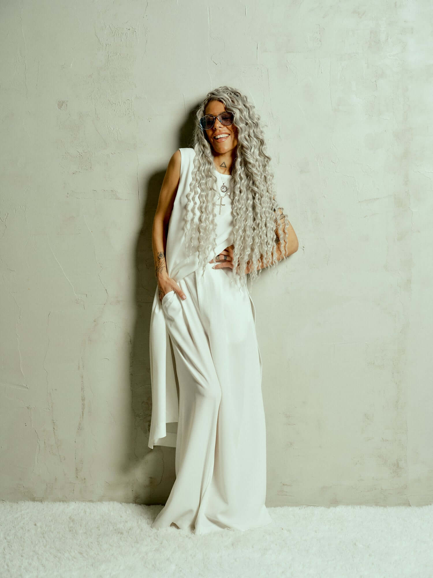 Oversized Wide-Leg Pants Designed for a relaxed fit that moves fluidly, these pants bring a quiet confidence to any look. The pleats at the front add definition to the wide-leg silhouette, creating a balance between structure and ease. Whether paired with