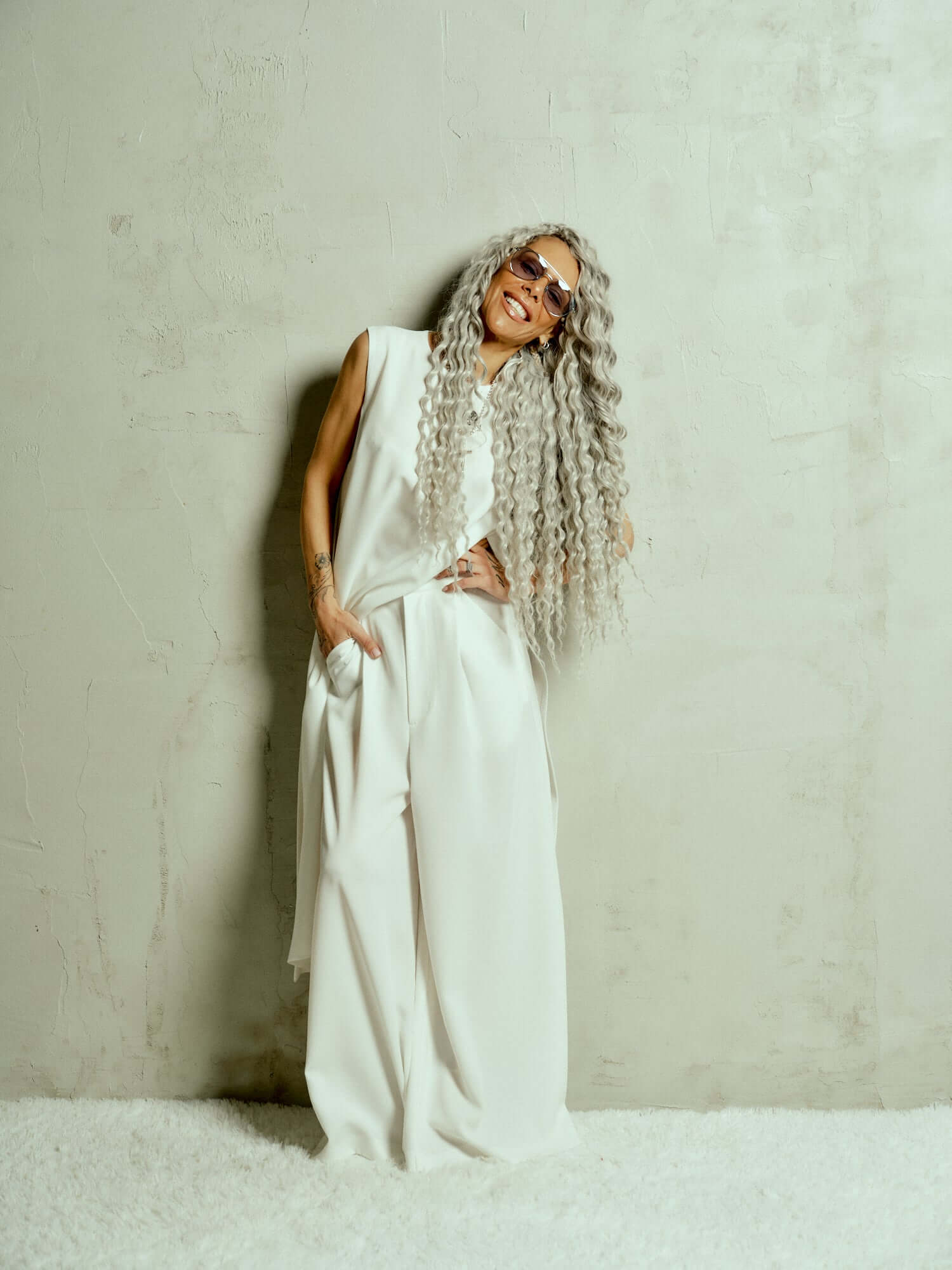 Oversized Wide-Leg Pants Designed for a relaxed fit that moves fluidly, these pants bring a quiet confidence to any look. The pleats at the front add definition to the wide-leg silhouette, creating a balance between structure and ease. Whether paired with