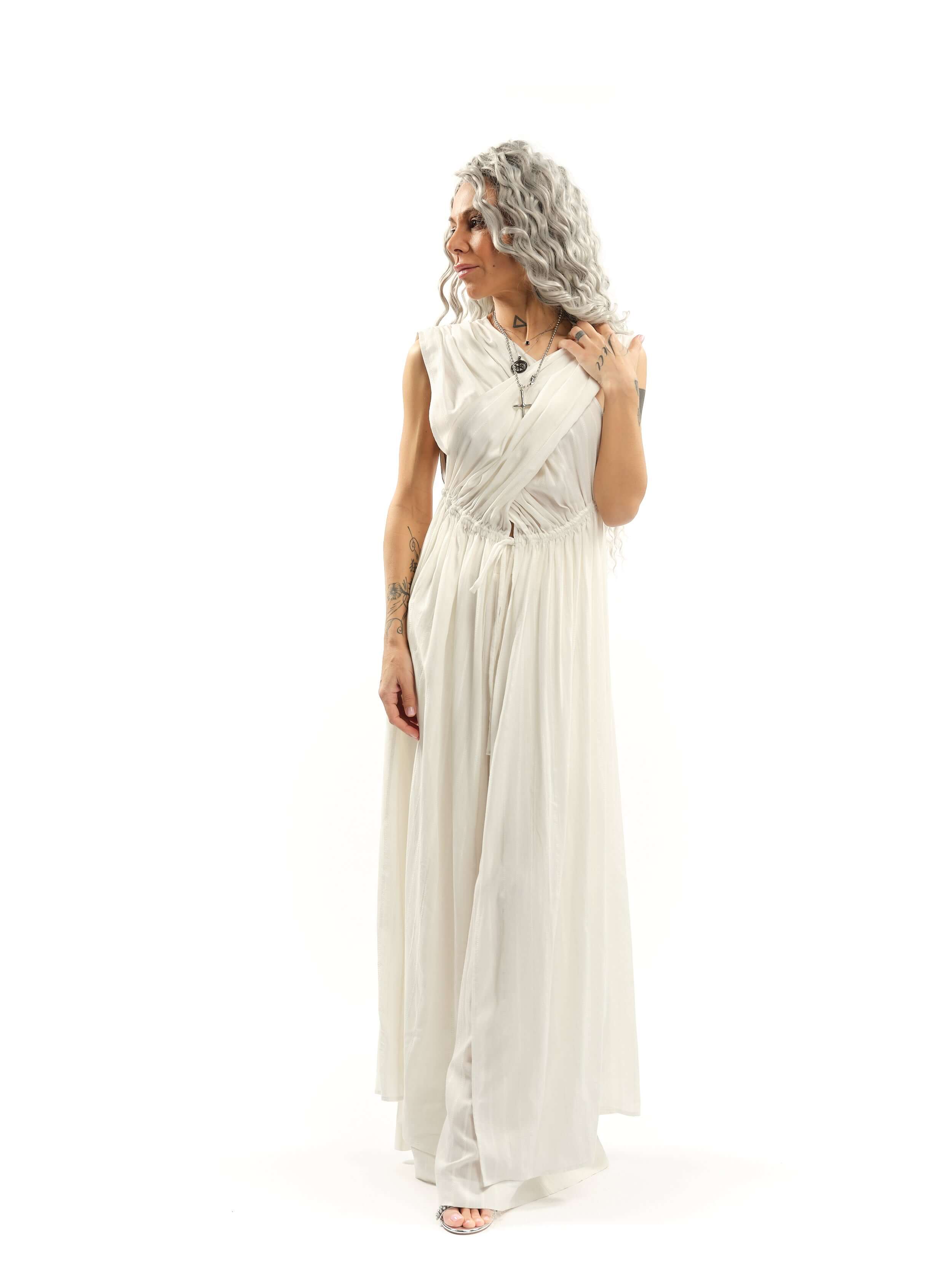 Criss-Crossed Ruched 2-Piece Co-Ord Set There’s an effortless drama to this set, the kind that turns even the simplest moment into something cinematic. The wrap-effect top clings and flows in all the right places, with adjustable ruched fabric that drapes