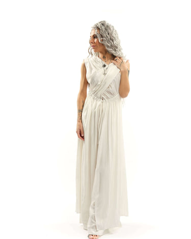 Criss-Crossed Ruched 2-Piece Co-Ord Set There’s an effortless drama to this set, the kind that turns even the simplest moment into something cinematic. The wrap-effect top clings and flows in all the right places, with adjustable ruched fabric that drapes