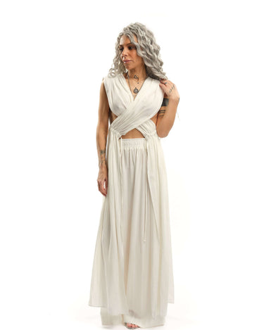 Criss-Crossed Ruched 2-Piece Co-Ord Set There’s an effortless drama to this set, the kind that turns even the simplest moment into something cinematic. The wrap-effect top clings and flows in all the right places, with adjustable ruched fabric that drapes