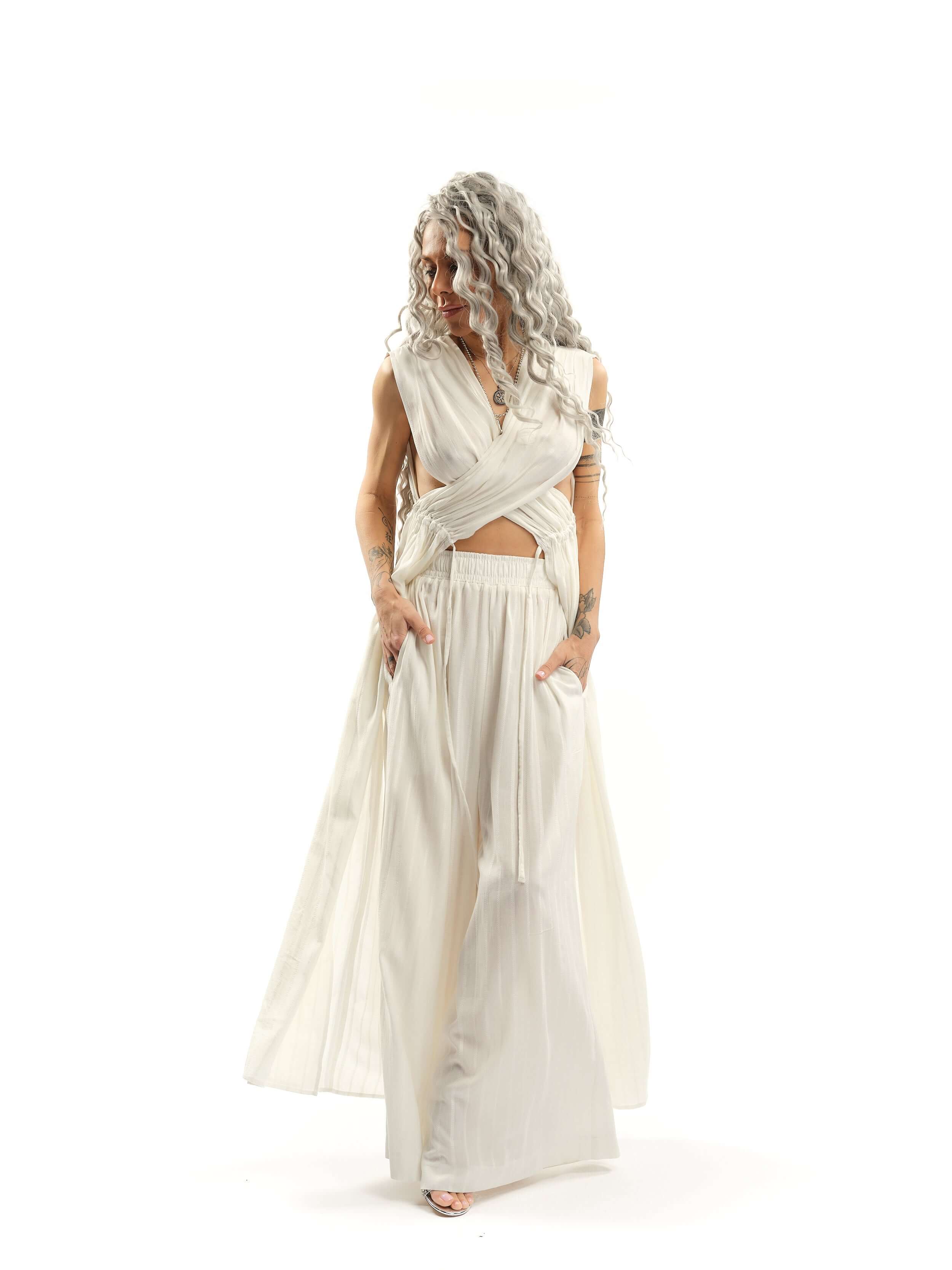 Criss-Crossed Ruched 2-Piece Co-Ord Set There’s an effortless drama to this set, the kind that turns even the simplest moment into something cinematic. The wrap-effect top clings and flows in all the right places, with adjustable ruched fabric that drapes
