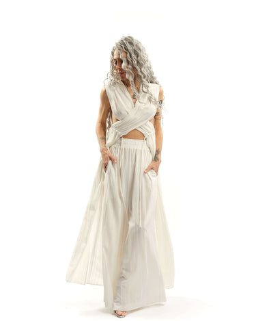 Criss-Crossed Ruched 2-Piece Co-Ord Set There’s an effortless drama to this set, the kind that turns even the simplest moment into something cinematic. The wrap-effect top clings and flows in all the right places, with adjustable ruched fabric that drapes