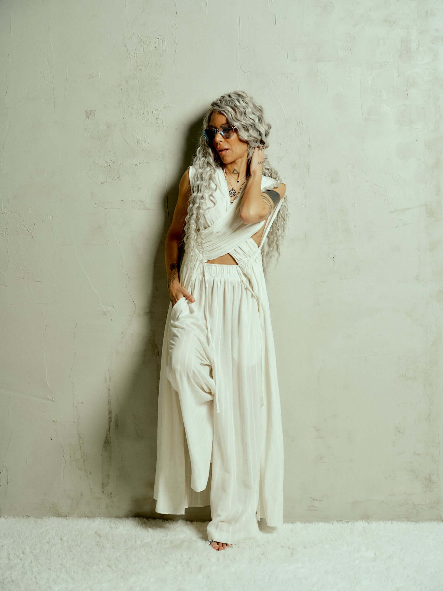Criss-Crossed Ruched 2-Piece Co-Ord Set There’s an effortless drama to this set, the kind that turns even the simplest moment into something cinematic. The wrap-effect top clings and flows in all the right places, with adjustable ruched fabric that drapes