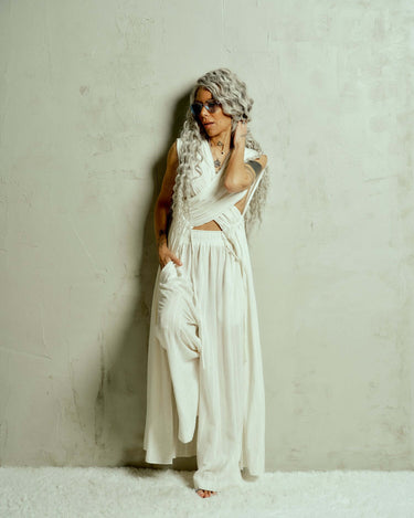 Criss-Crossed Ruched 2-Piece Co-Ord Set There’s an effortless drama to this set, the kind that turns even the simplest moment into something cinematic. The wrap-effect top clings and flows in all the right places, with adjustable ruched fabric that drapes