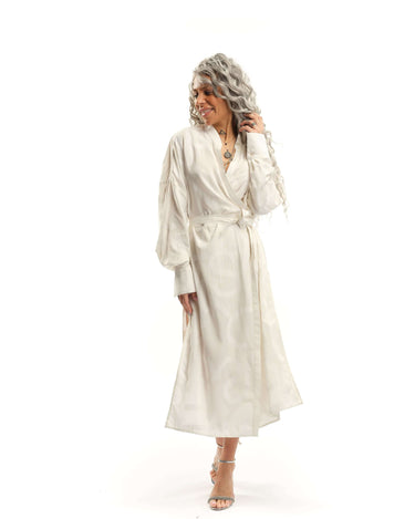 Printed Maxi Wrap-Dress This wrap dress drapes effortlessly, bringing an air of nonchalance that comes with knowing you don't have to try. A barely-there tonal print of oversized letters runs across the length of the fabric, creating a quiet contrast. Wea