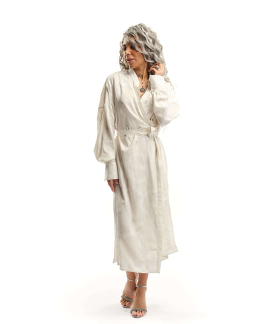 Printed Maxi Wrap-Dress This wrap dress drapes effortlessly, bringing an air of nonchalance that comes with knowing you don't have to try. A barely-there tonal print of oversized letters runs across the length of the fabric, creating a quiet contrast. Wea