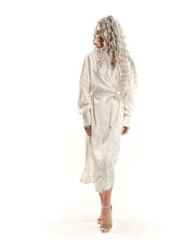 Printed Maxi Wrap-Dress This wrap dress drapes effortlessly, bringing an air of nonchalance that comes with knowing you don't have to try. A barely-there tonal print of oversized letters runs across the length of the fabric, creating a quiet contrast. Wea