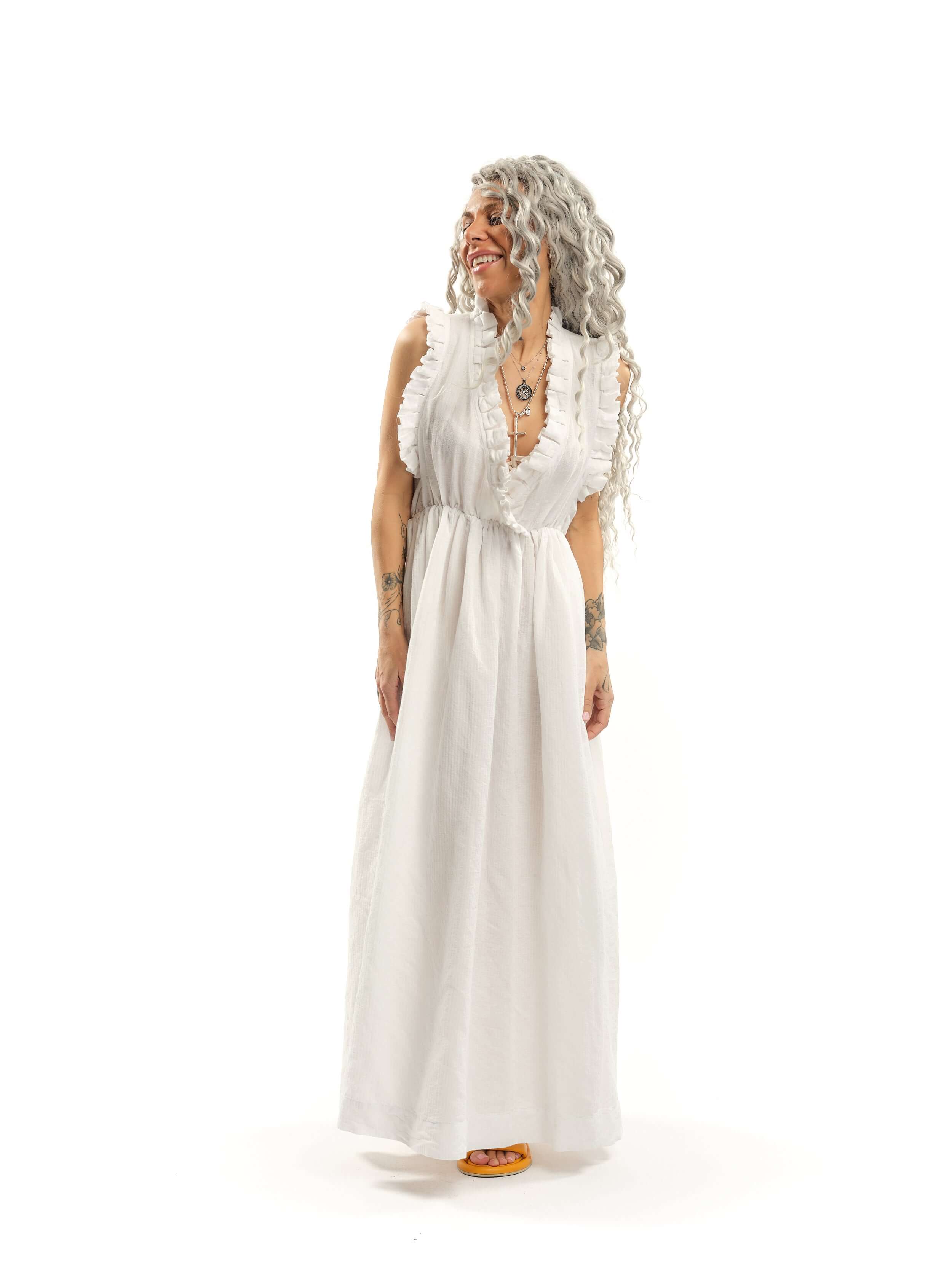 Ruffled Cotton-Blend Maxi Dress There’s something about ruffles that feels like pure romance. Cut from airy fabric, this dress moves with you, making every step feel like part of a story, one filled with golden afternoons, candlelit dinners, and the kind