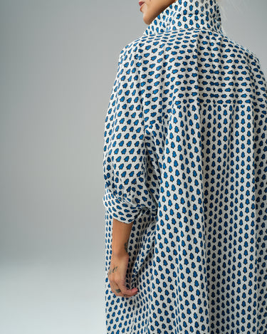 Back view of an oversized shirt dress with blue micro floral print, perfect for relaxed comfort and style.