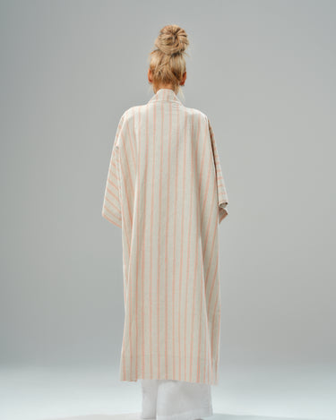 Lightweight striped linen-cotton kimono, showcasing a relaxed silhouette and elegant drape from the back.