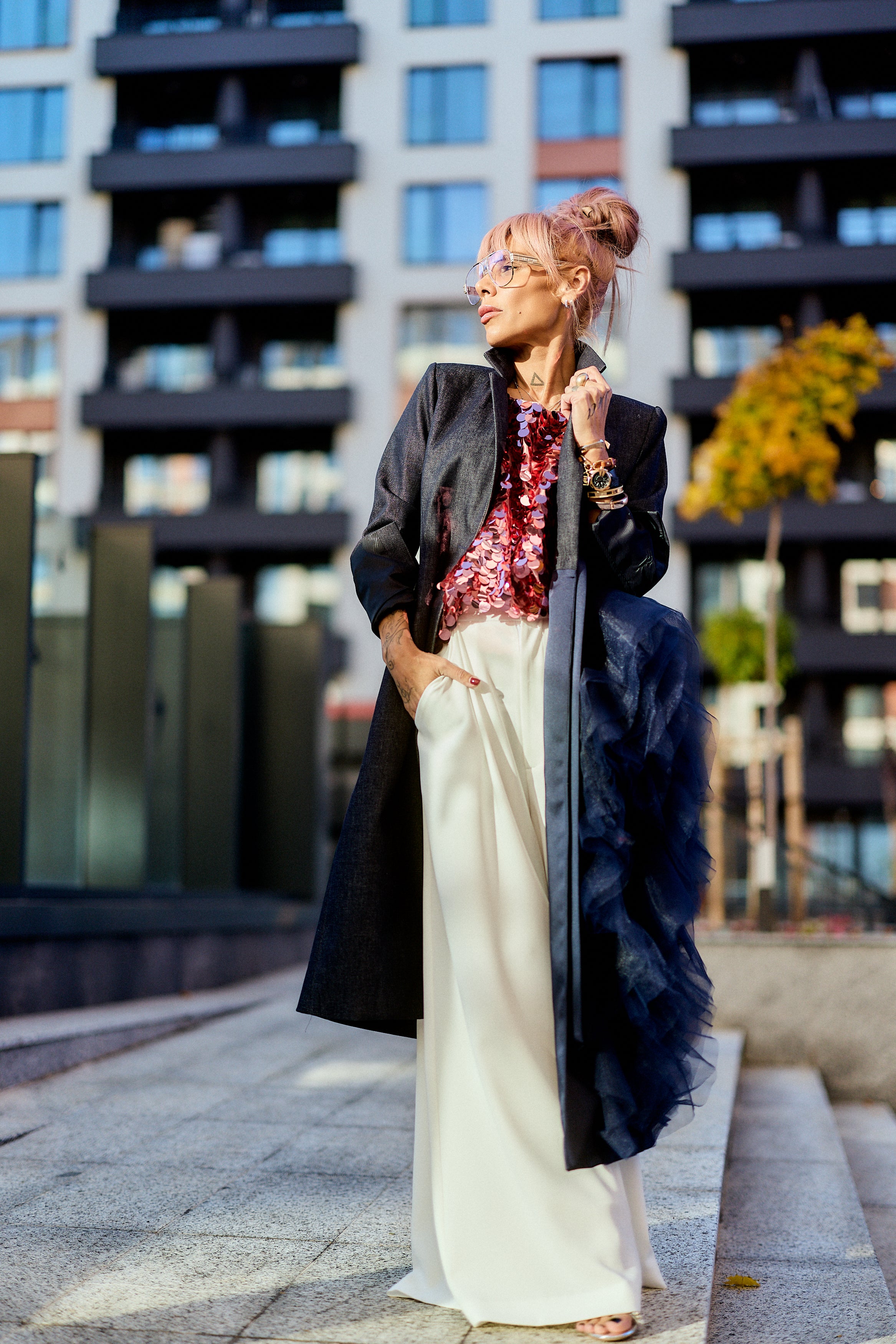 Model wearing a Denim Tulle Detail Blazer with tulle ruffle, styled for urban chic look.
