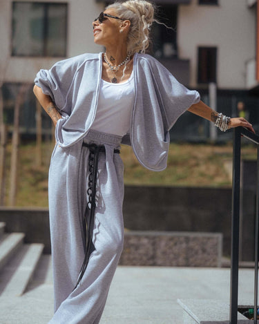 Grey Relaxed Lounge Set on a model outdoors, showcasing effortless style with cropped top and voluminous pants.