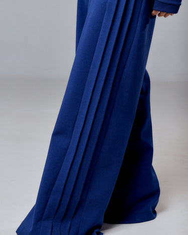 Navy Blue 3-Piece Set showcasing wide-leg pants with elegant pleats, symbolizing modern comfort and sophistication.