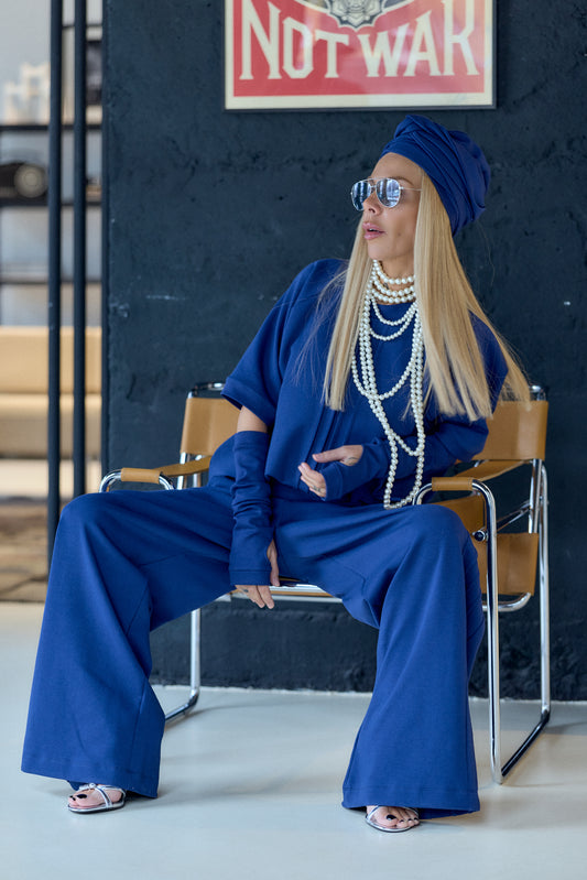 Navy Blue 3-Piece Set featuring relaxed top, wide-leg pants, and matching gloves in a stylish modern setting.