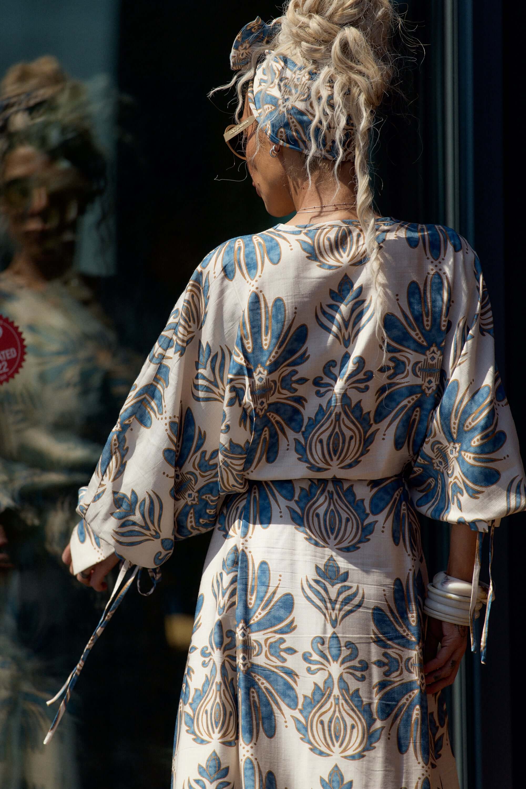 Back view of woman wearing a Bohemian Print Two-Piece Co-ord Set with oversized sleeves and a flowing silhouette.