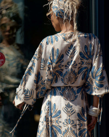 Back view of woman wearing a Bohemian Print Two-Piece Co-ord Set with oversized sleeves and a flowing silhouette.