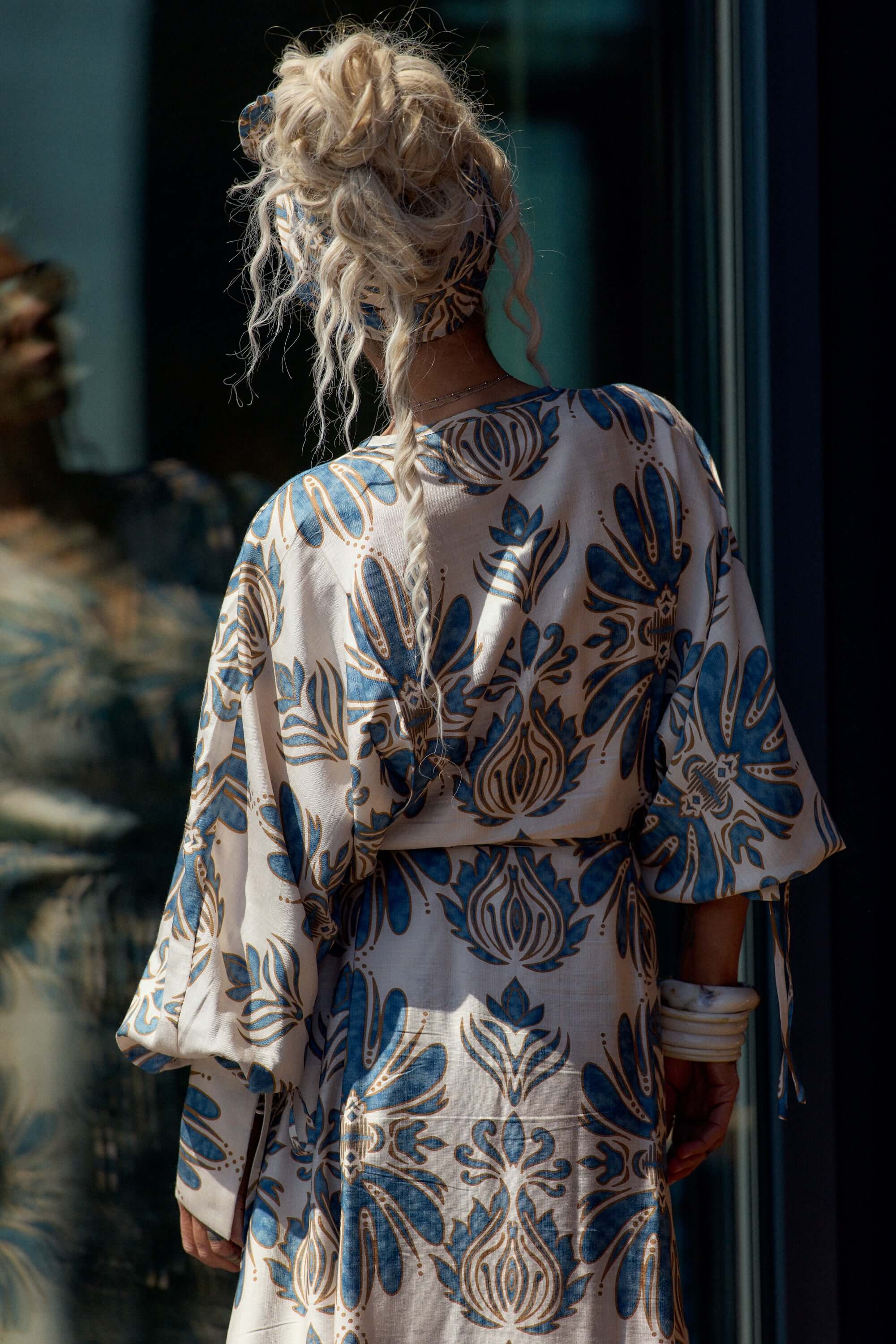Back view of a model wearing Bohemian Print Two-Piece Co-ord Set with a flowing kimono-style top and wide palazzo trousers.