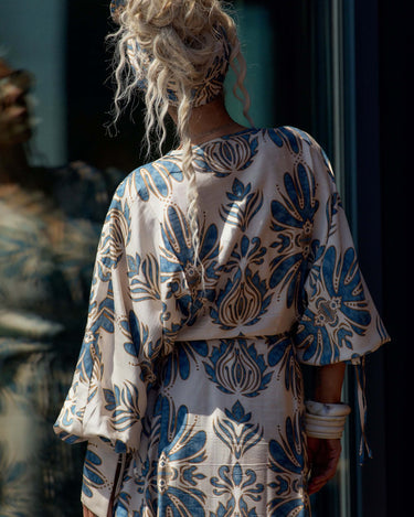Back view of a model wearing Bohemian Print Two-Piece Co-ord Set with a flowing kimono-style top and wide palazzo trousers.